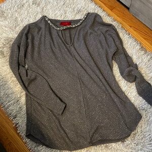 Jenifer Lopez sweater with diamonds